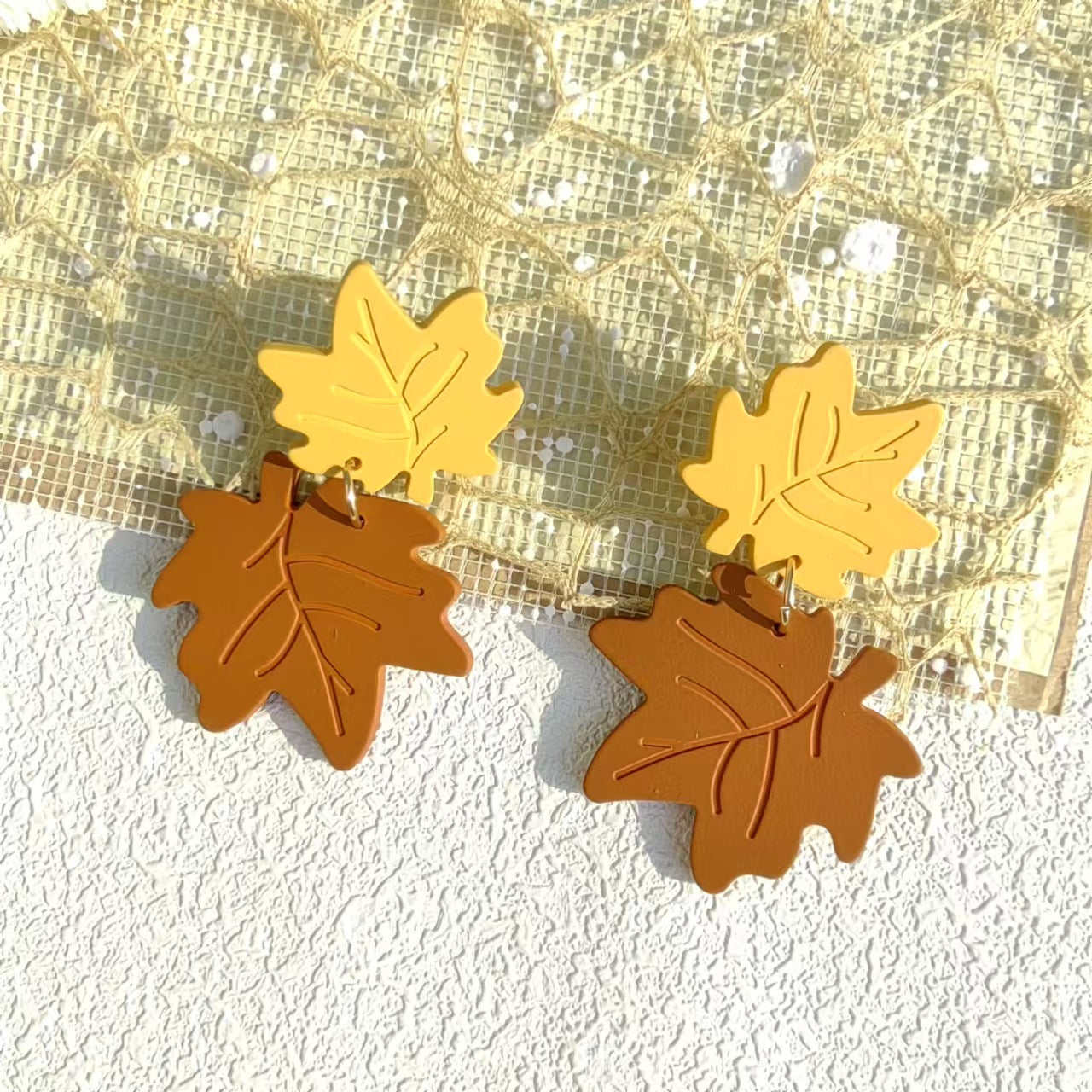 Wholesale Acrylic maple leaf stitching exaggerated cute earrings