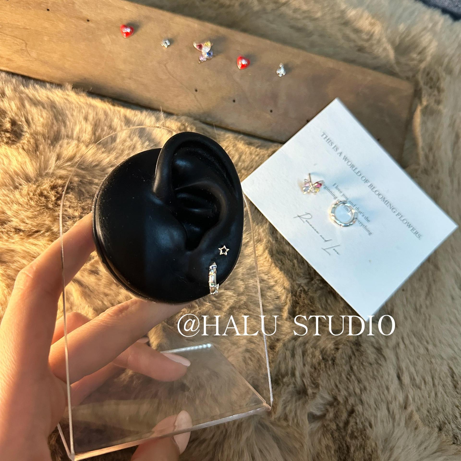 Wholesale  Titanium Steel color earrings hollow stars holiday earrings