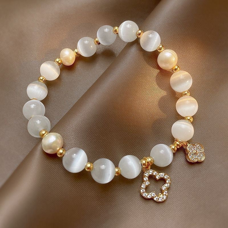 Wholesale Four Leaf Clover Imitation Cat S Eye Glass Pearl Bracelet Women S Everyday Wear Boutique Resale Jewelry Accessory