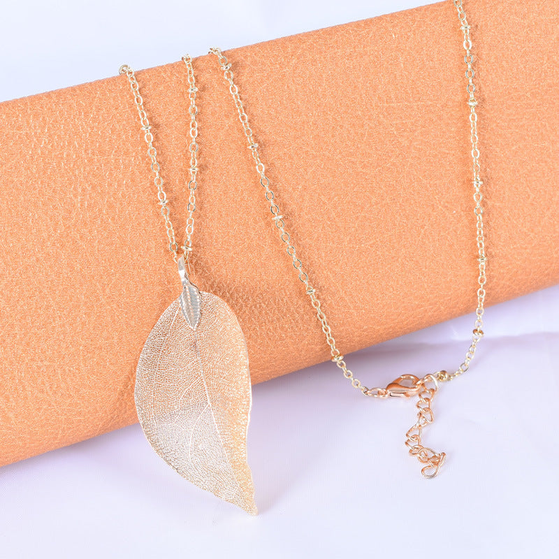 Wholesale simple hollow leaf sweater chain
