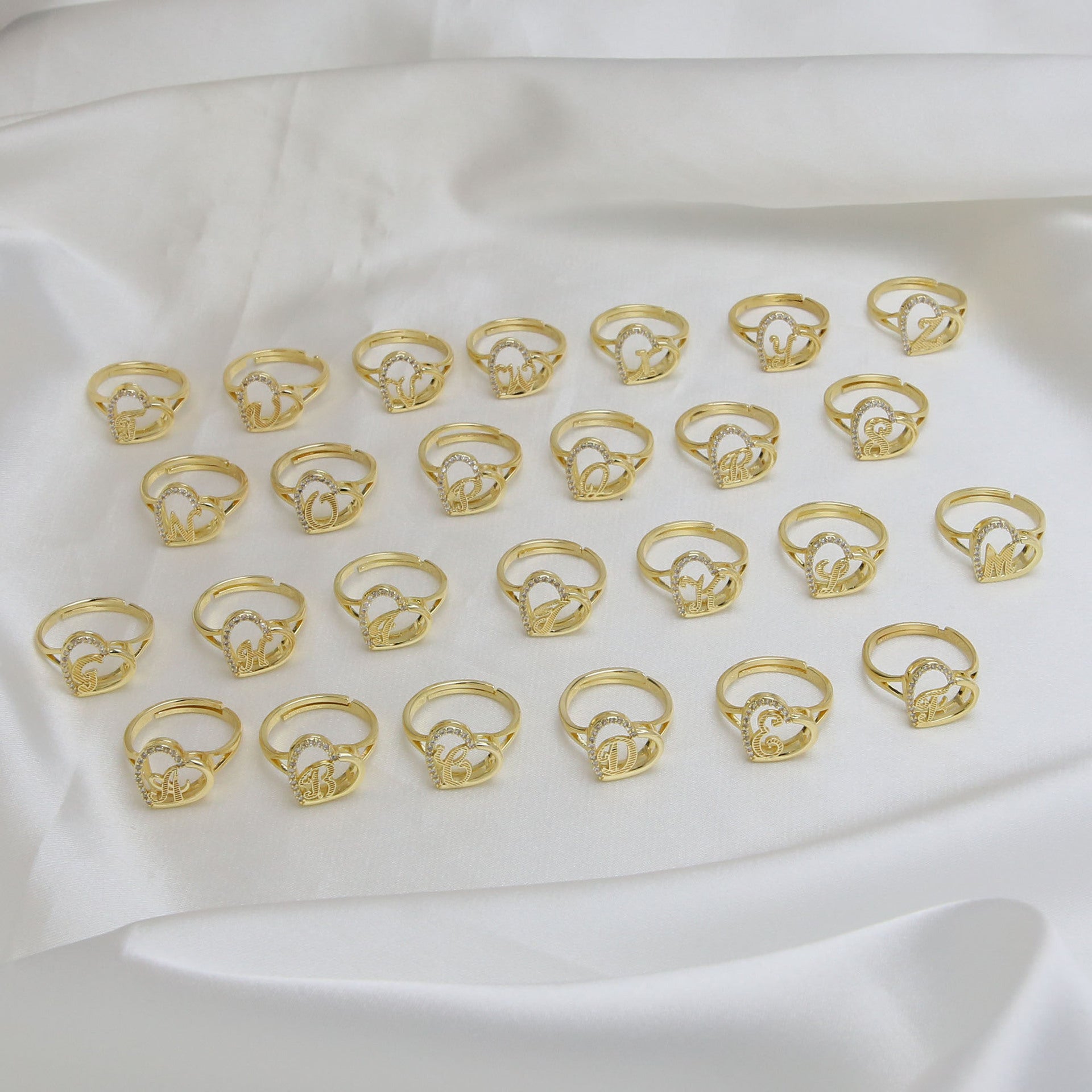 Wholesale  white gold heart-shaped love texture hollow 26 grass English letters open heart ring