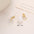 Wholesale pearl retro round shiny ear hooks earrings