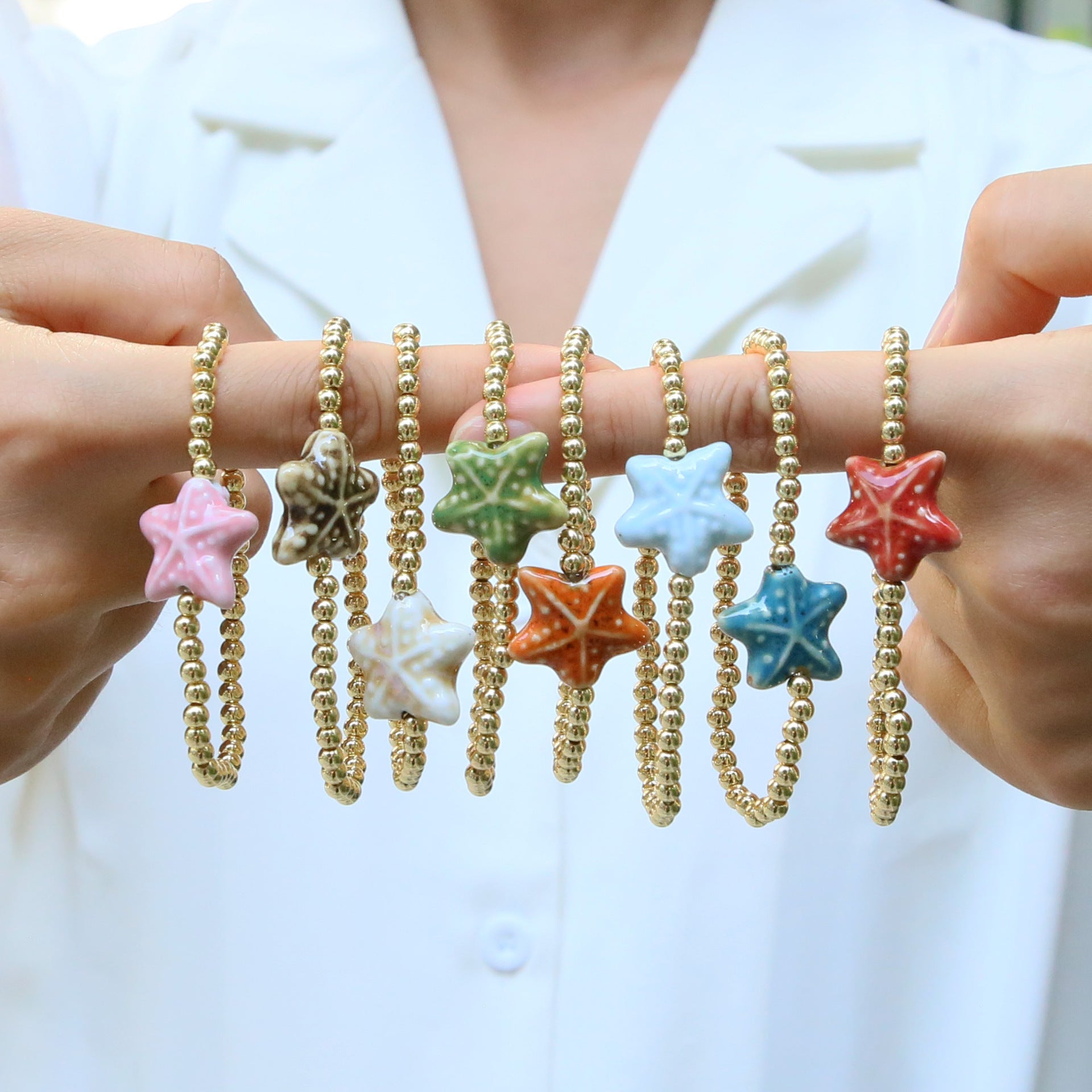 Wholesale Ceramic colored glass starfish elastic rope copper bead bracelet