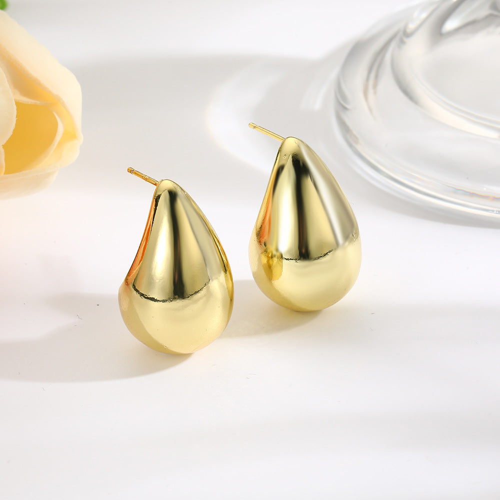 Wholesale Copper plated 18 gold hollow glossy water drop stud earrings