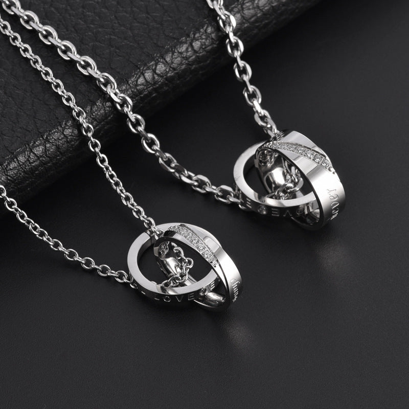 Collana all'ingrosso con doppio anello in acciaio al titanio con diamanti