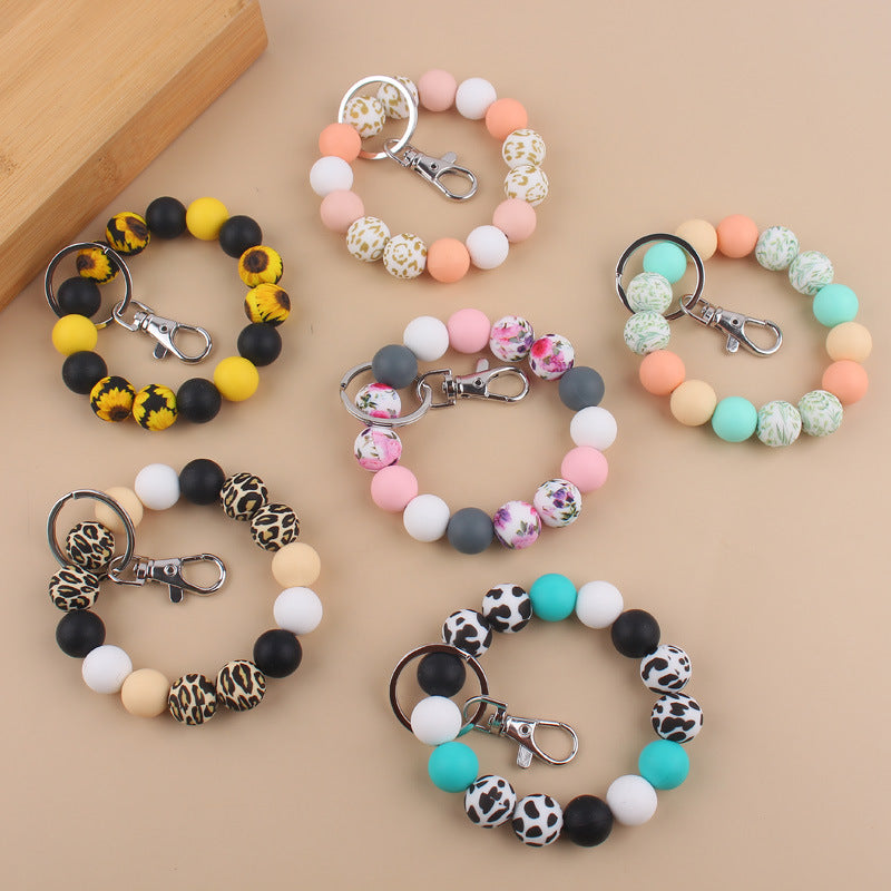 Wholesale Cow Pattern Sunflower Pattern Silicone Beaded Wrist Keychain ACC-KC-GuangTian024