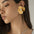 Wholesale Metal Texture Three-Dimensional Ginkgo Leaf Flower Earrings