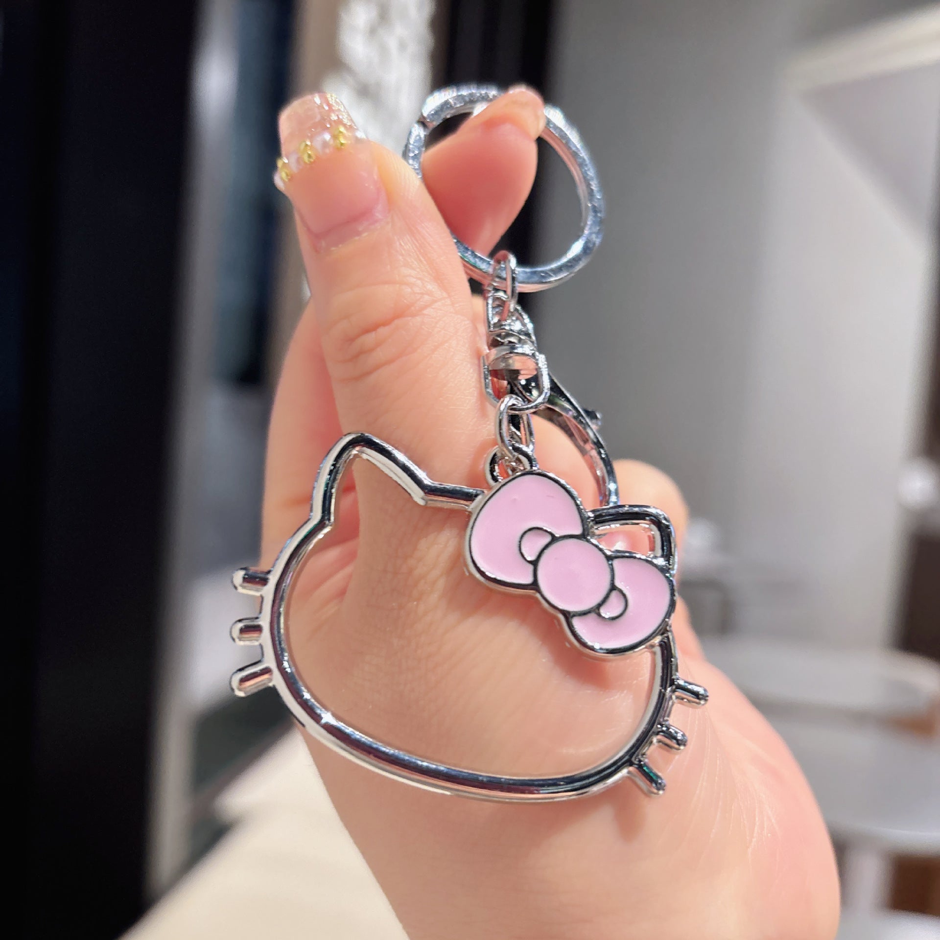 Wholesale hollow paint KT cat alloy key chain cute cartoon girl bag decoration