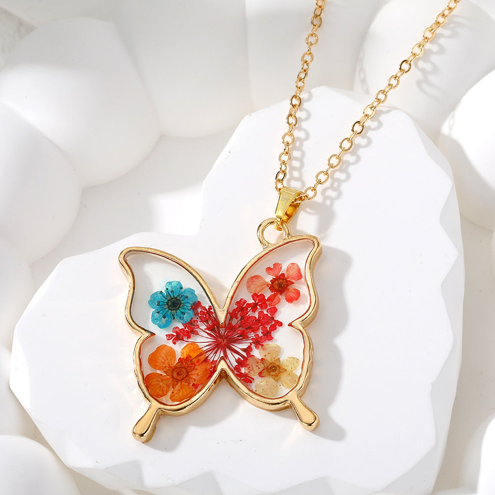 Wholesale Resin Dried Flower Butterfly Pendant Necklace Boutique Resale