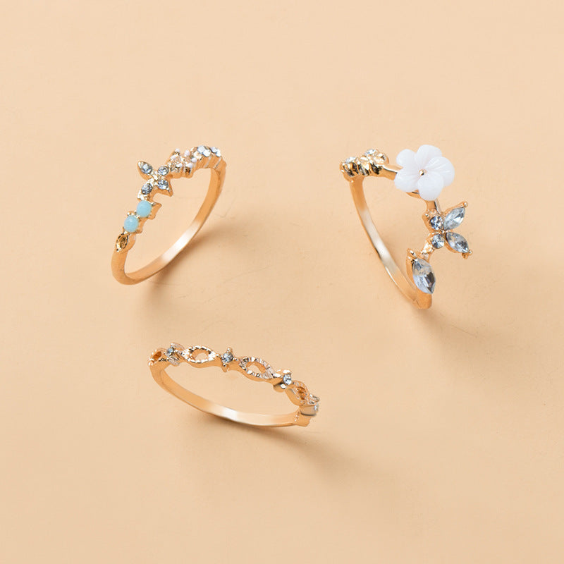 Wholesale fashion alloy opening colored diamond flower hollow ring suit