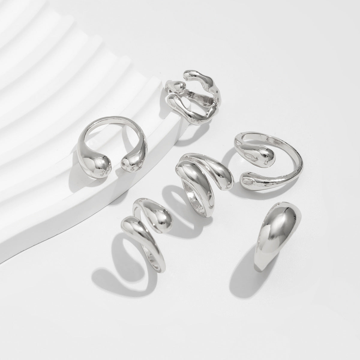 Wholesale Geometric three-dimensional cross-opening smooth alloy ring set