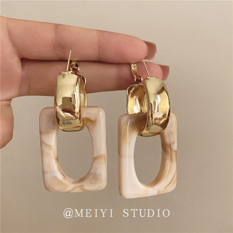 Wholesale retro hollow geometric acrylic silver needle light luxury earrings