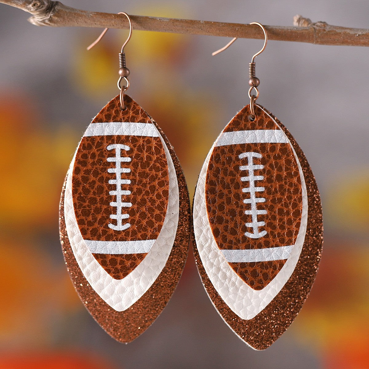 Wholesale Teardrop-shaped football acrylic leather earrings