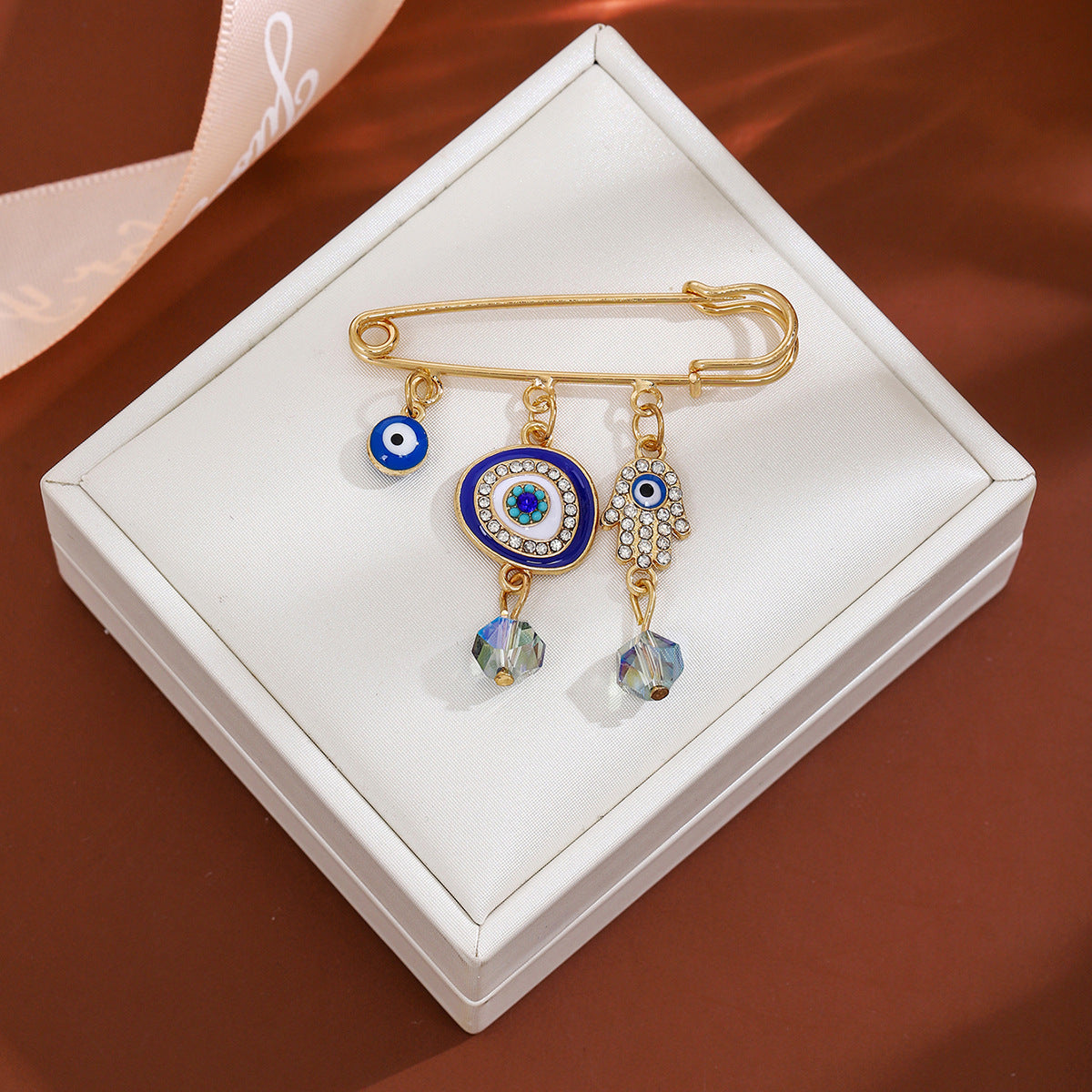 Wholesale Diamond-encrusted Devil' s Eye Tassel Brooch