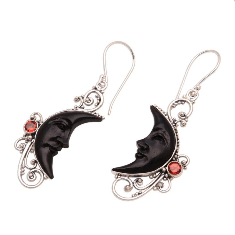 Wholesale  hollow  personality carved gem black moon sun face earrings