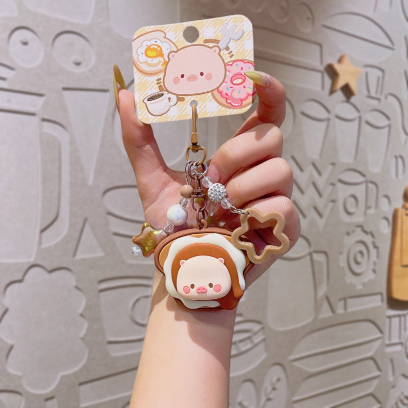 Wholesale Cute cartoon PVC pig spinning donut keychain