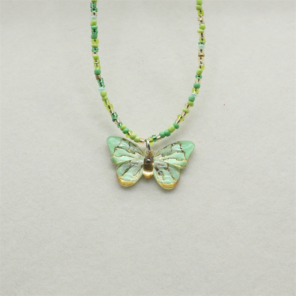Wholesale gradient color bronzing butterfly sweet pendant rice beads beaded necklace