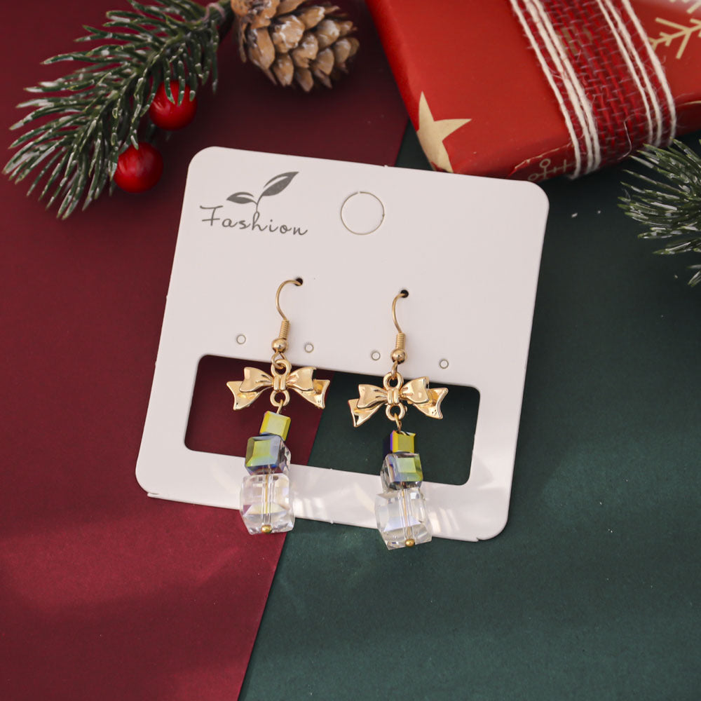 Orecchini in cristallo con stella e fiocco all'ingrosso