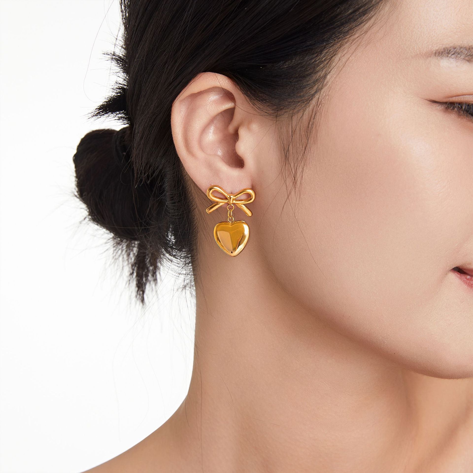 Wholesale Bow Heart Pendant 18K Gold Titanium Steel Earrings ACC-ES-OMK004