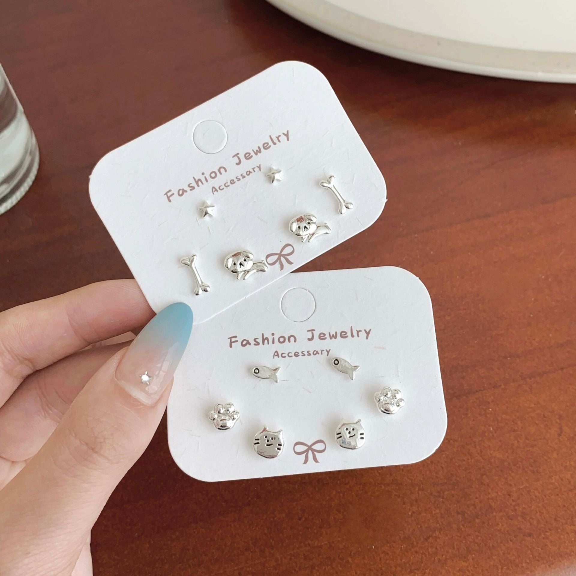 Wholesale Cute cartoon silver needle earrings with a small design