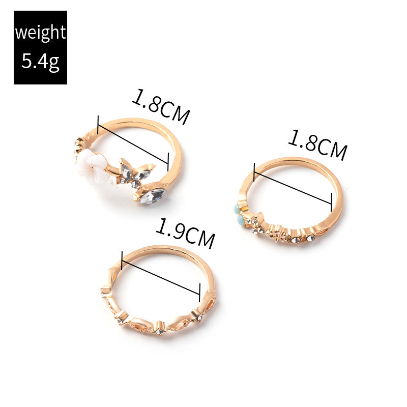 Wholesale fashion alloy opening colored diamond flower hollow ring suit