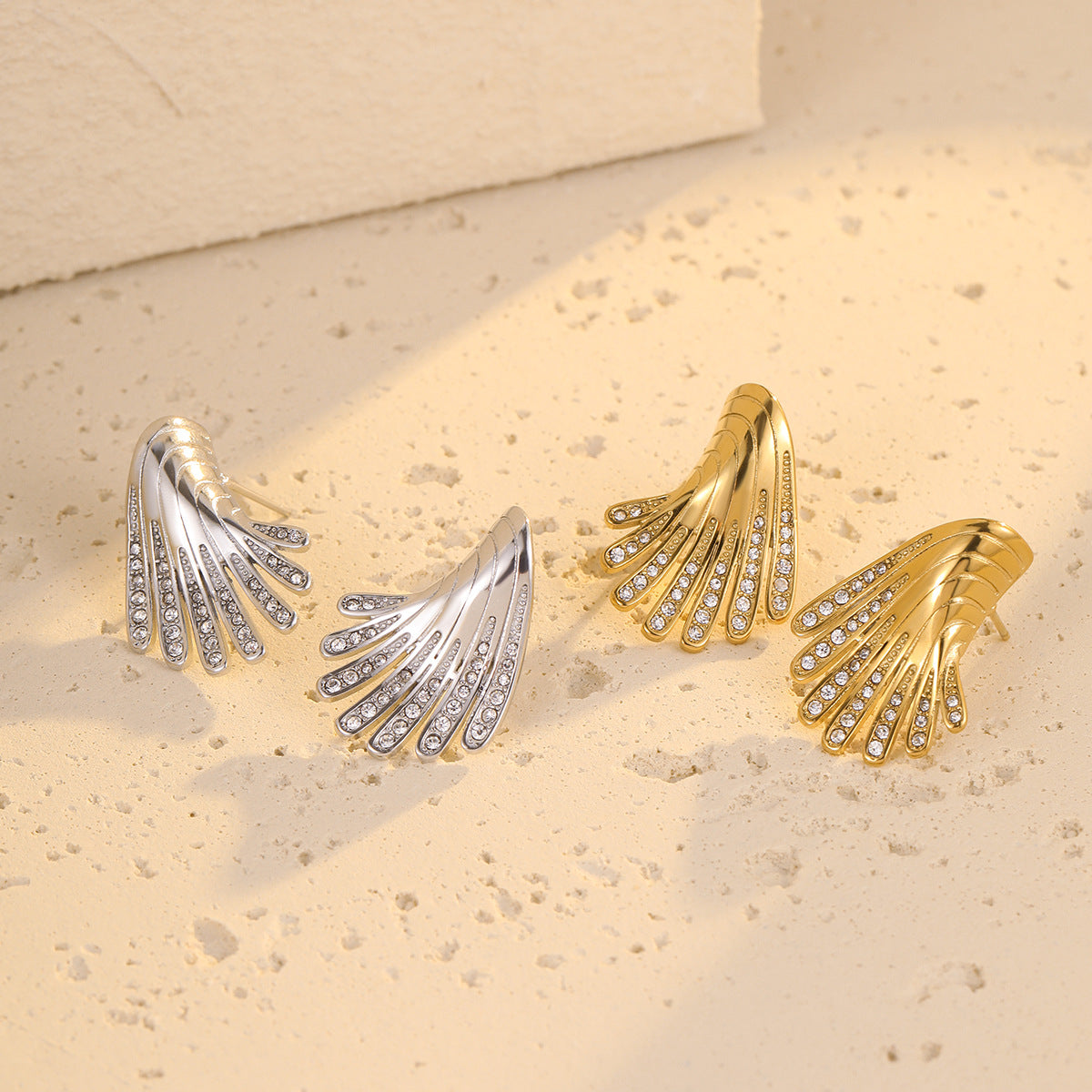 Wholesale exaggerated stainless steel irregular wings micro-inlaid zircon earrings