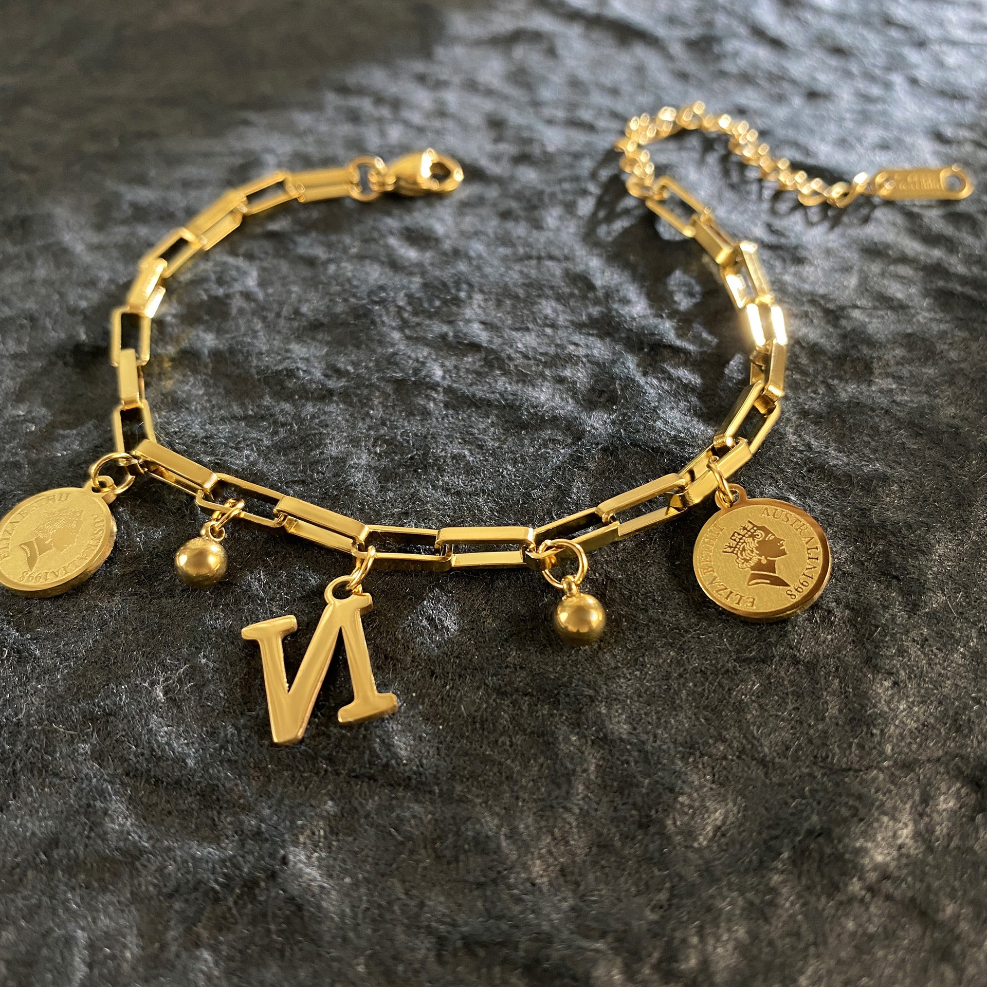 Wholesale Titanium Steel 18K Gold Plated Queen's Head Letter Bracelet ACC-BT-YuXun007