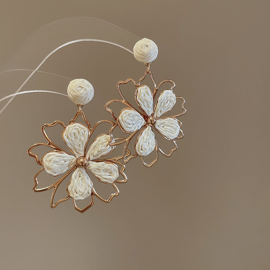 Wholesale  hollowed-out flower silver needle earrings