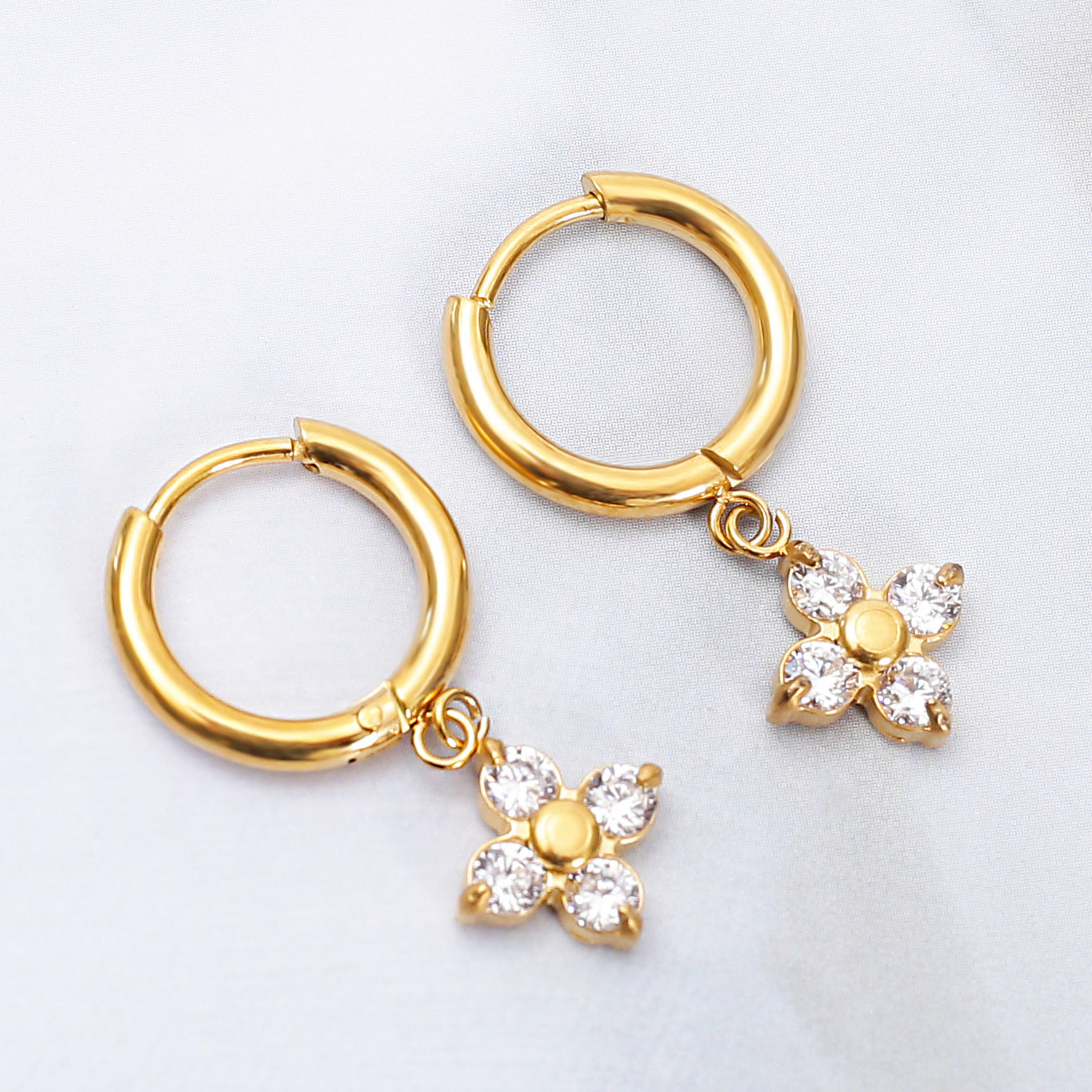 Wholesale Stainless steel flower earrings with zircon inlay