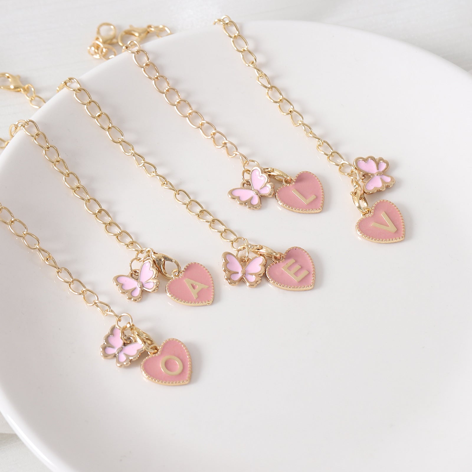 Wholesale 26 English Letter Butterfly Brand Oil Drip Cup Accessories ACC-CA-Hans003