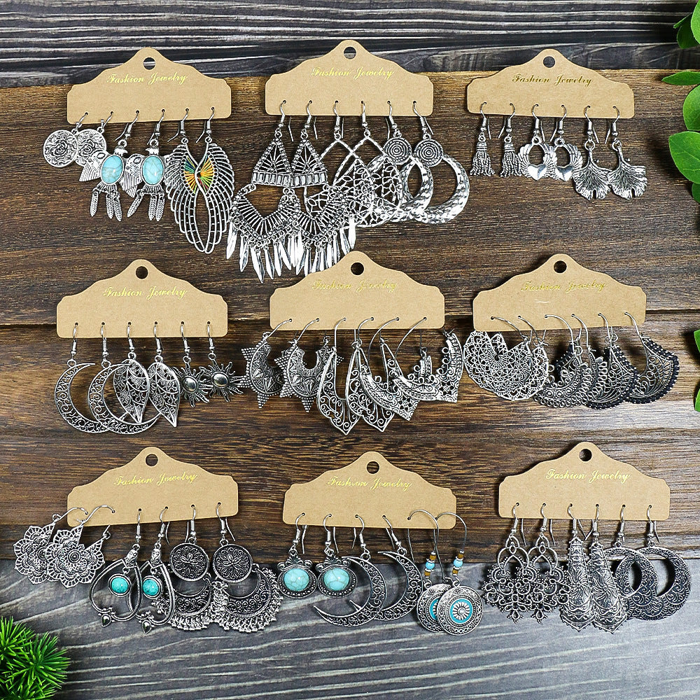 Wholesale Electroplated Alloy Vintage Earrings,  Snowflake Tassel Hollow Design,  Fashion Accessory for Boutique Resale