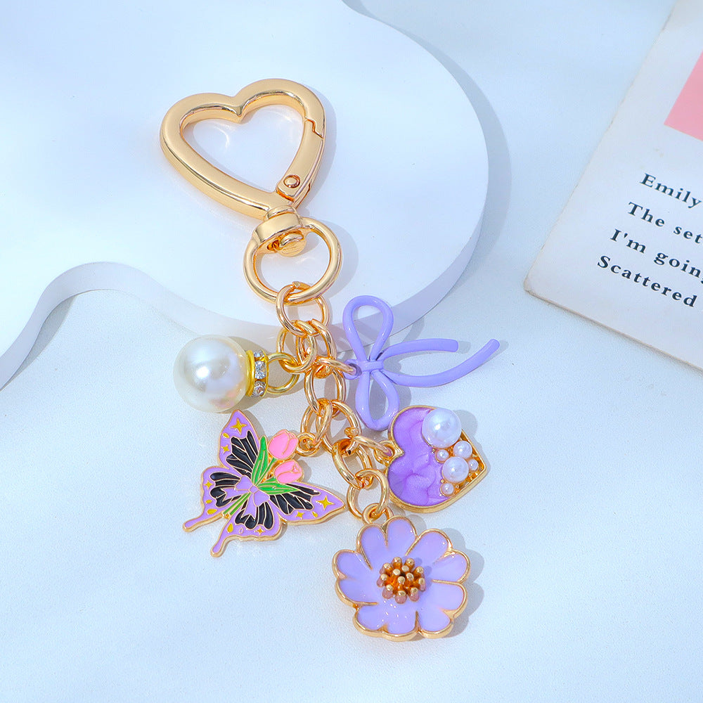 Wholesale Enamel Butterfly Flower Keychain with Pearl Pendant - Trendy Car Key Accessory