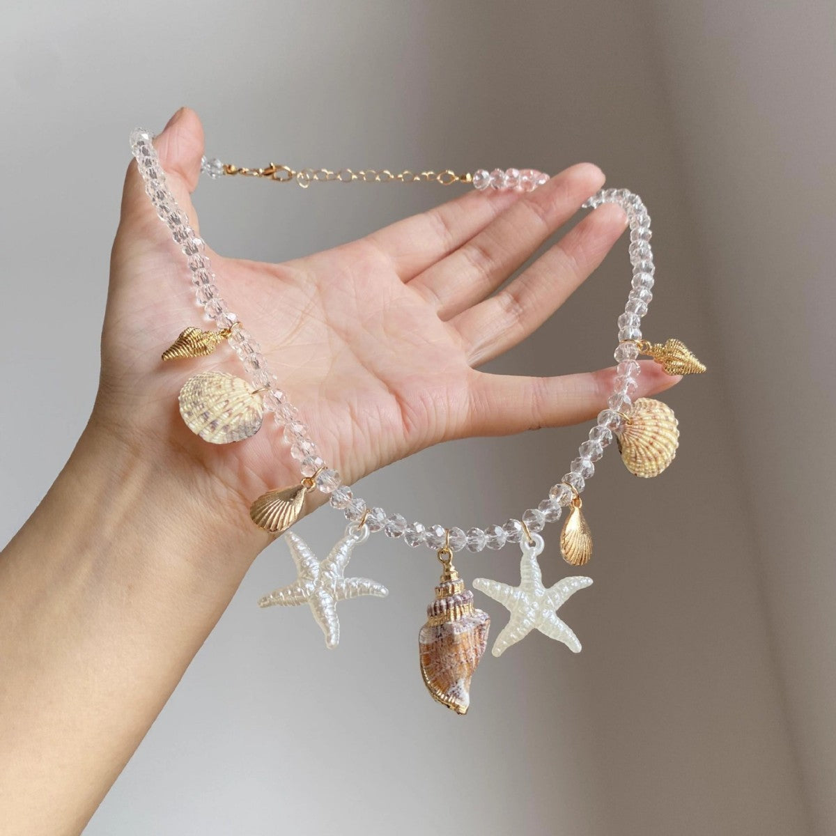 Wholesale starfish conch and seashell necklace