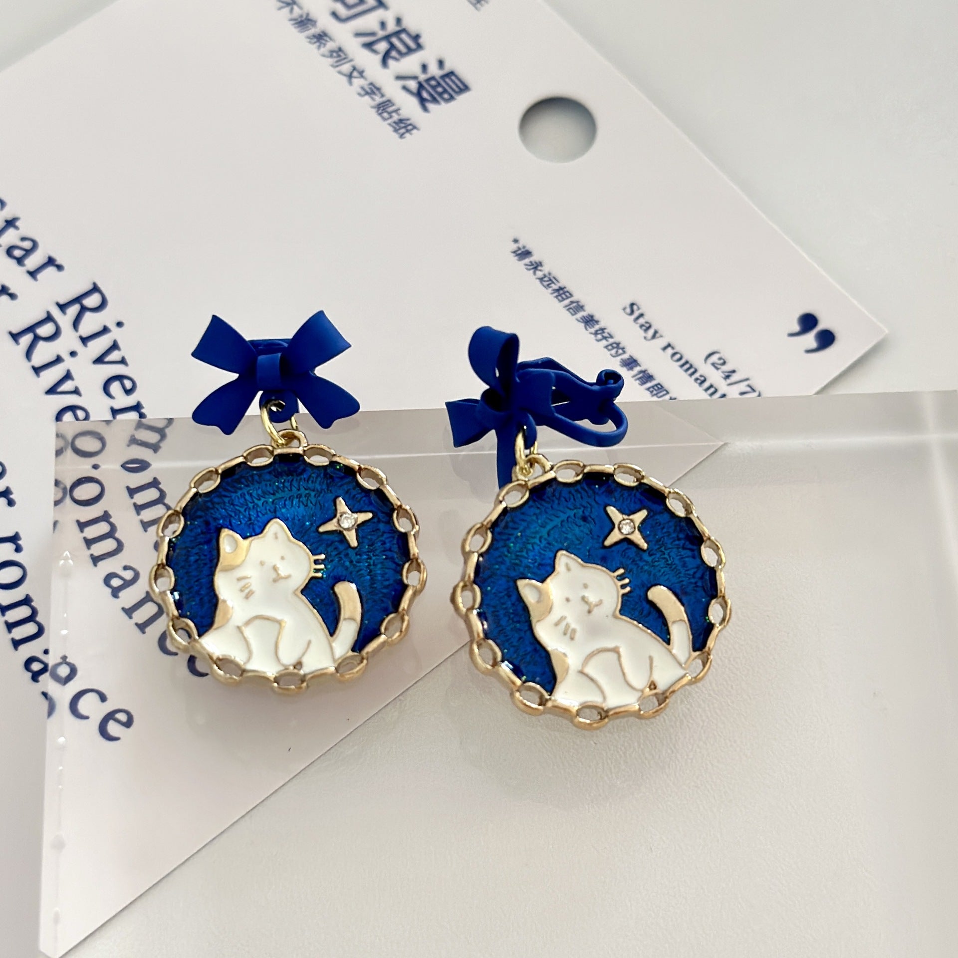 Wholesale blue bow cat earrings