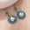 Wholesale Turquoise earrings retro western ethnic style alloy flower earrings