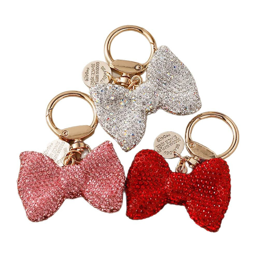 Wholesale Metal keychain with full rhinestone butterfly and bowknot pendant