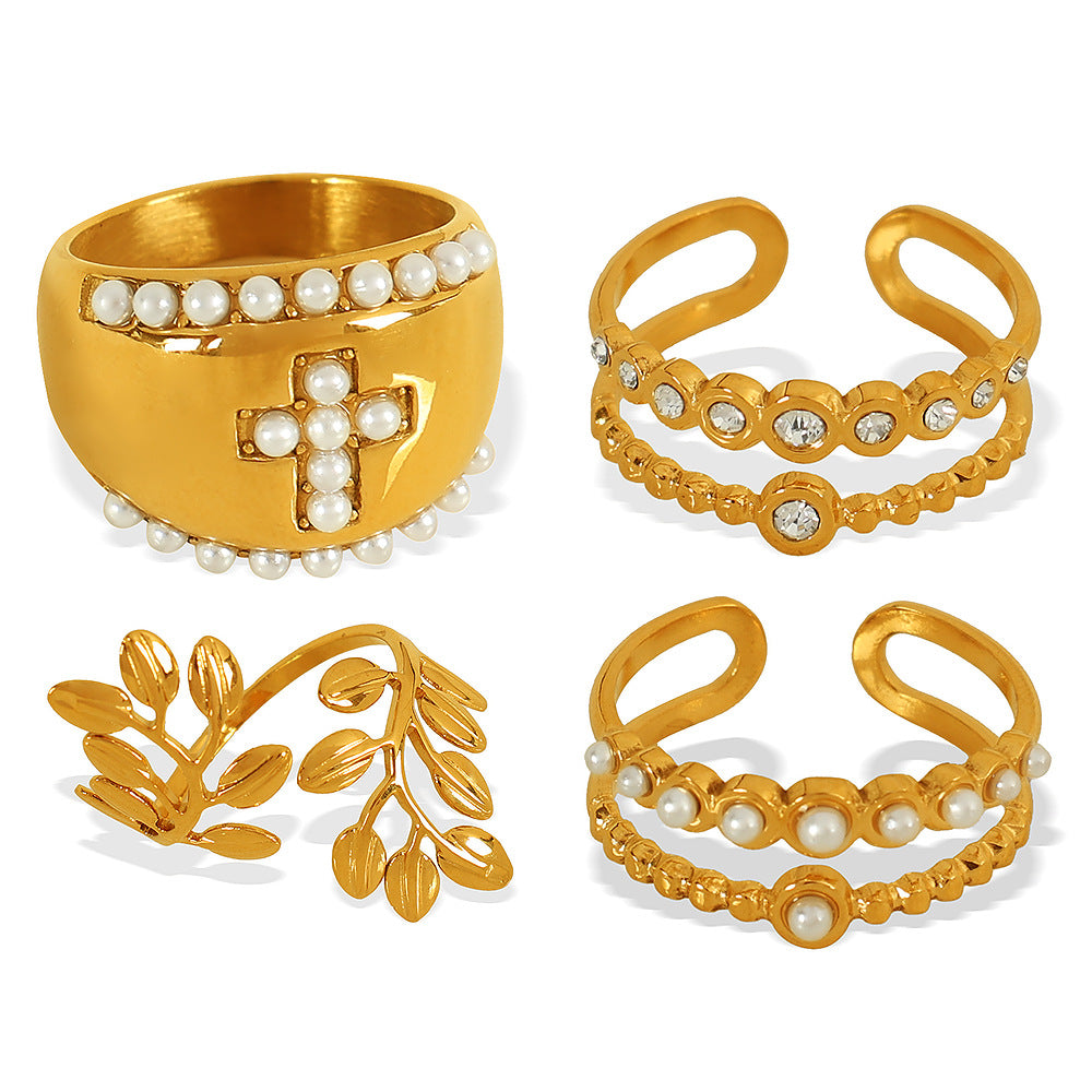Wholesale high sense inlaid imitation pearl rhinestone ring retro titanium steel cross leaf ring jewelry
