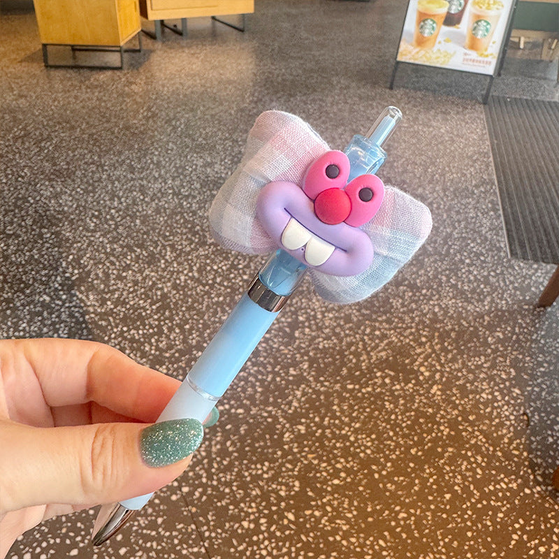 Wholesale Funny big-eyed sausage-mouth bow ballpoint pen
