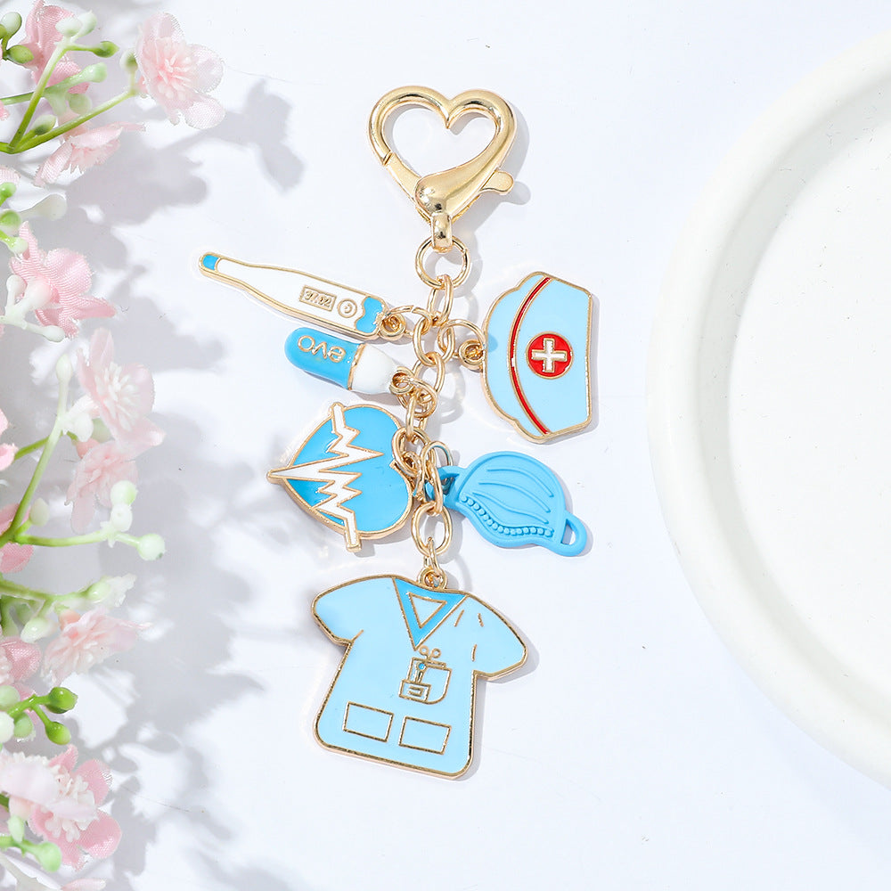 Wholesale Classic nurse cap thermometer pill mask heartbeat nurse suit zinc alloy keychain