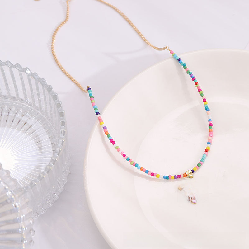 Wholesale Bohemian Rice Bead Single Layer Alloy Oil Drop Bowknot Necklace