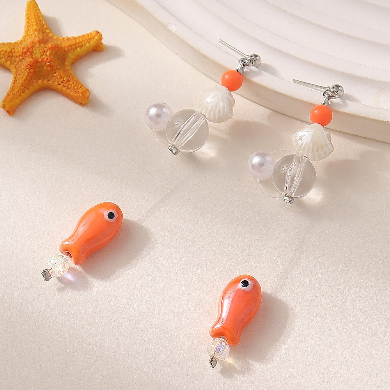 Wholesale Geometric round transparent crystal beads cute sea fish earrings