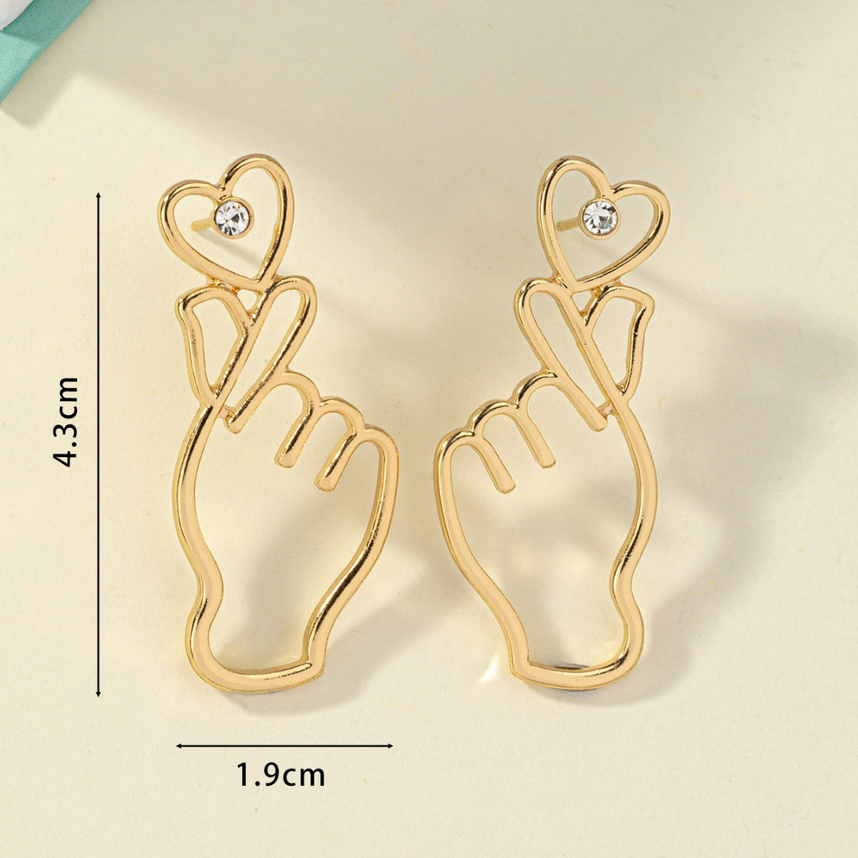 Wholesale heart inlaid rhinestone earrings