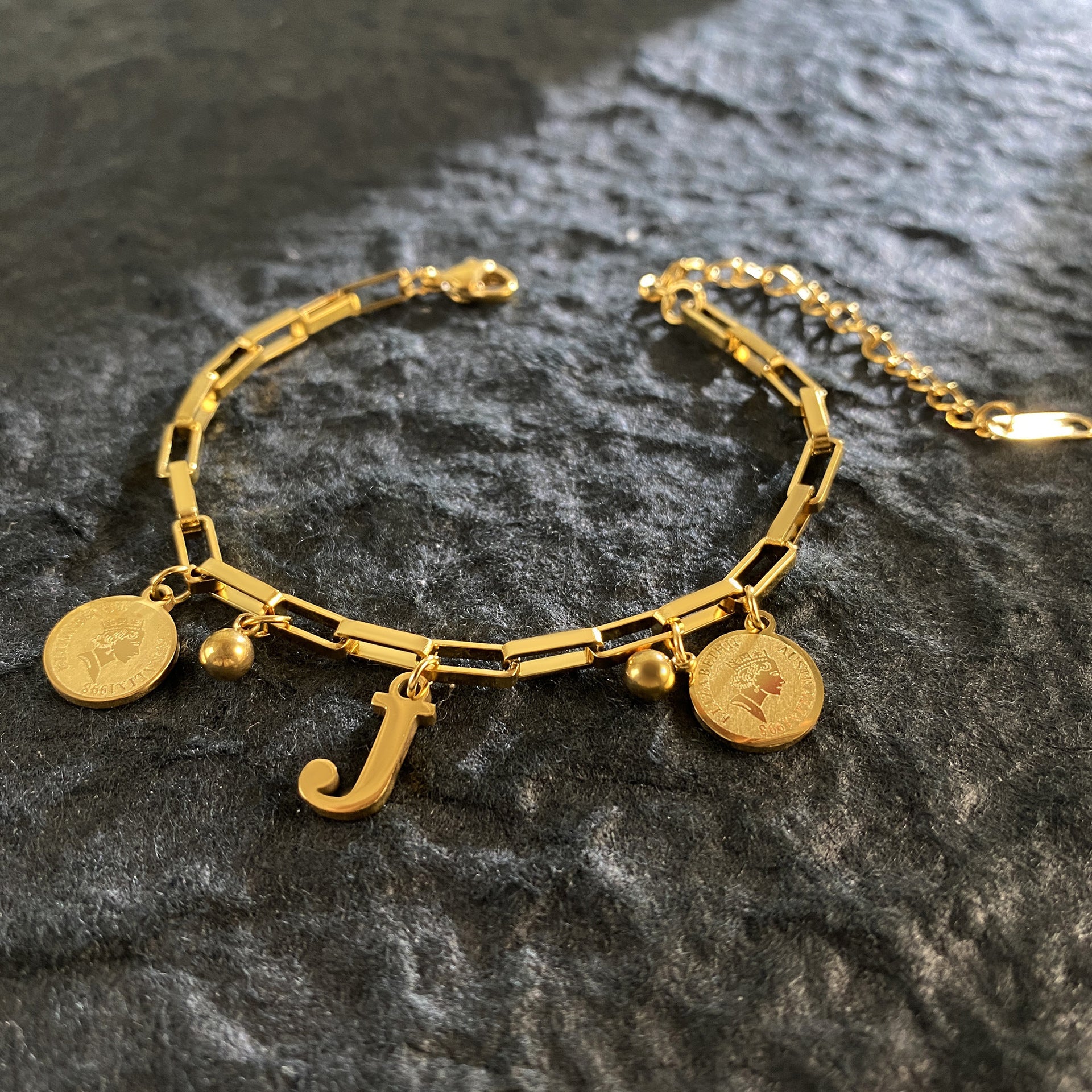 Wholesale Titanium Steel 18K Gold Plated Queen's Head Letter Bracelet ACC-BT-YuXun007