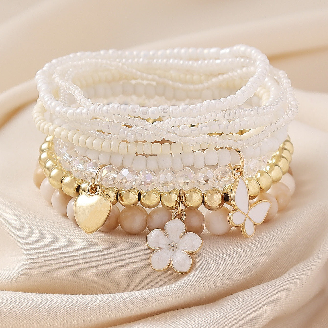 Wholesale Bohemian Flower Love Butterfly Pendant Bungee String Pearl Stacking Bracelet Set