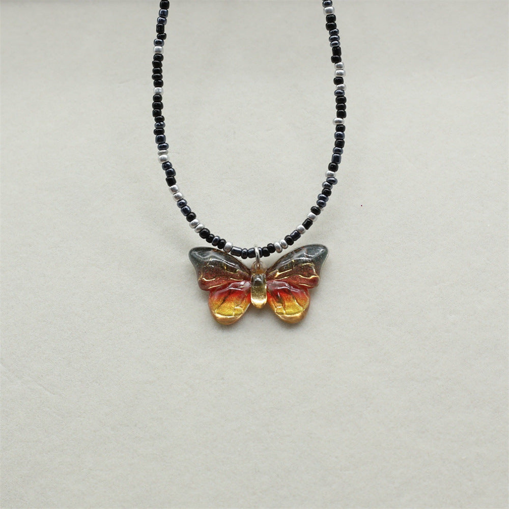 Wholesale gradient color bronzing butterfly sweet pendant rice beads beaded necklace
