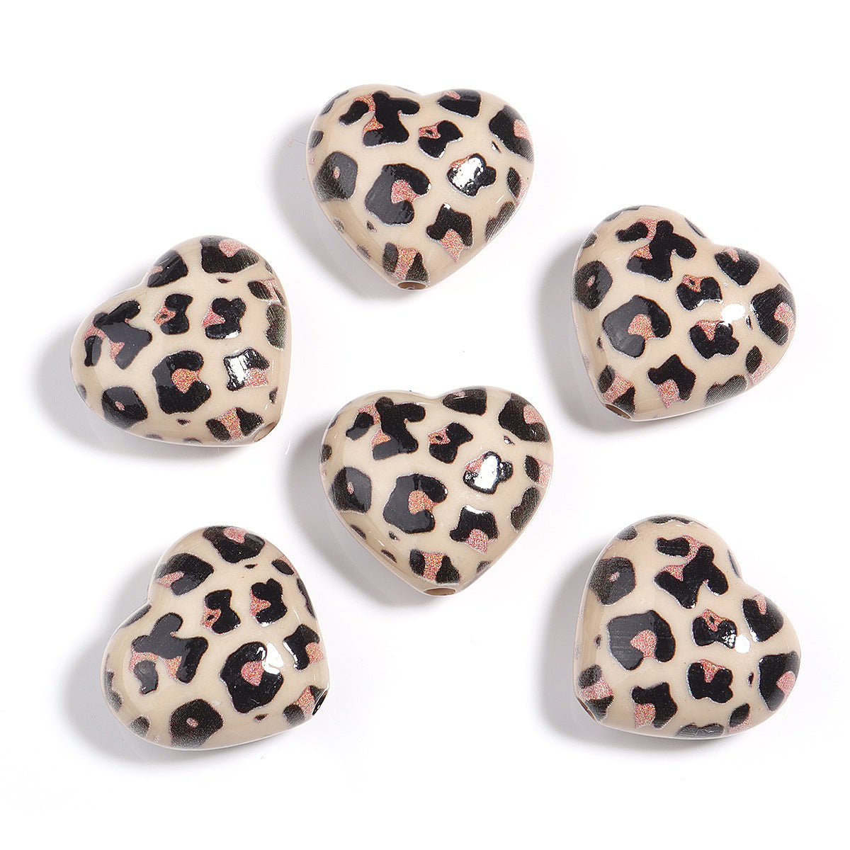 Wholesale 5pcs Acrylic Beads of colorful leopard print heart-shaped acrylic beads for DIY crafts.