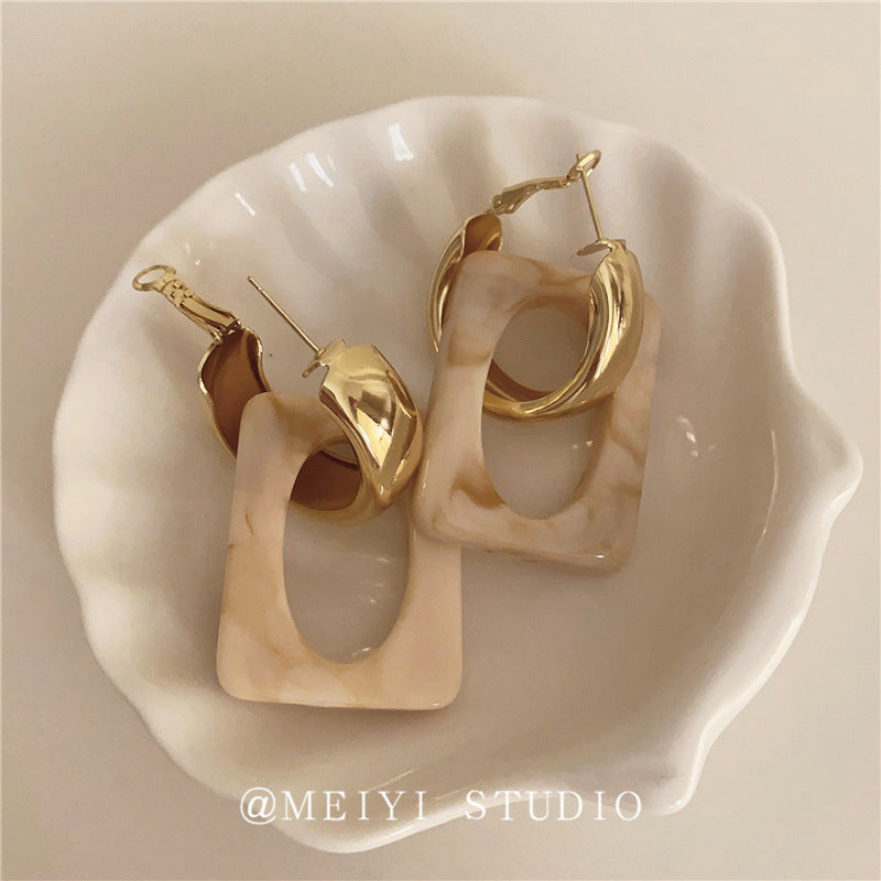 Wholesale retro hollow geometric acrylic silver needle light luxury earrings