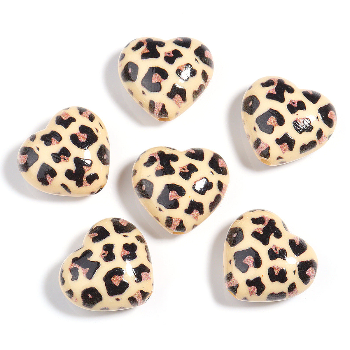 Wholesale 5pcs Acrylic Beads of colorful leopard print heart-shaped acrylic beads for DIY crafts.