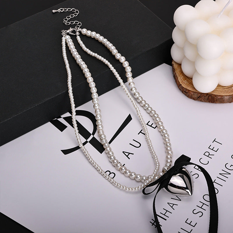 Wholesale Pearl Long Woolen Chain Love Pendant Flannel Bow Necklace