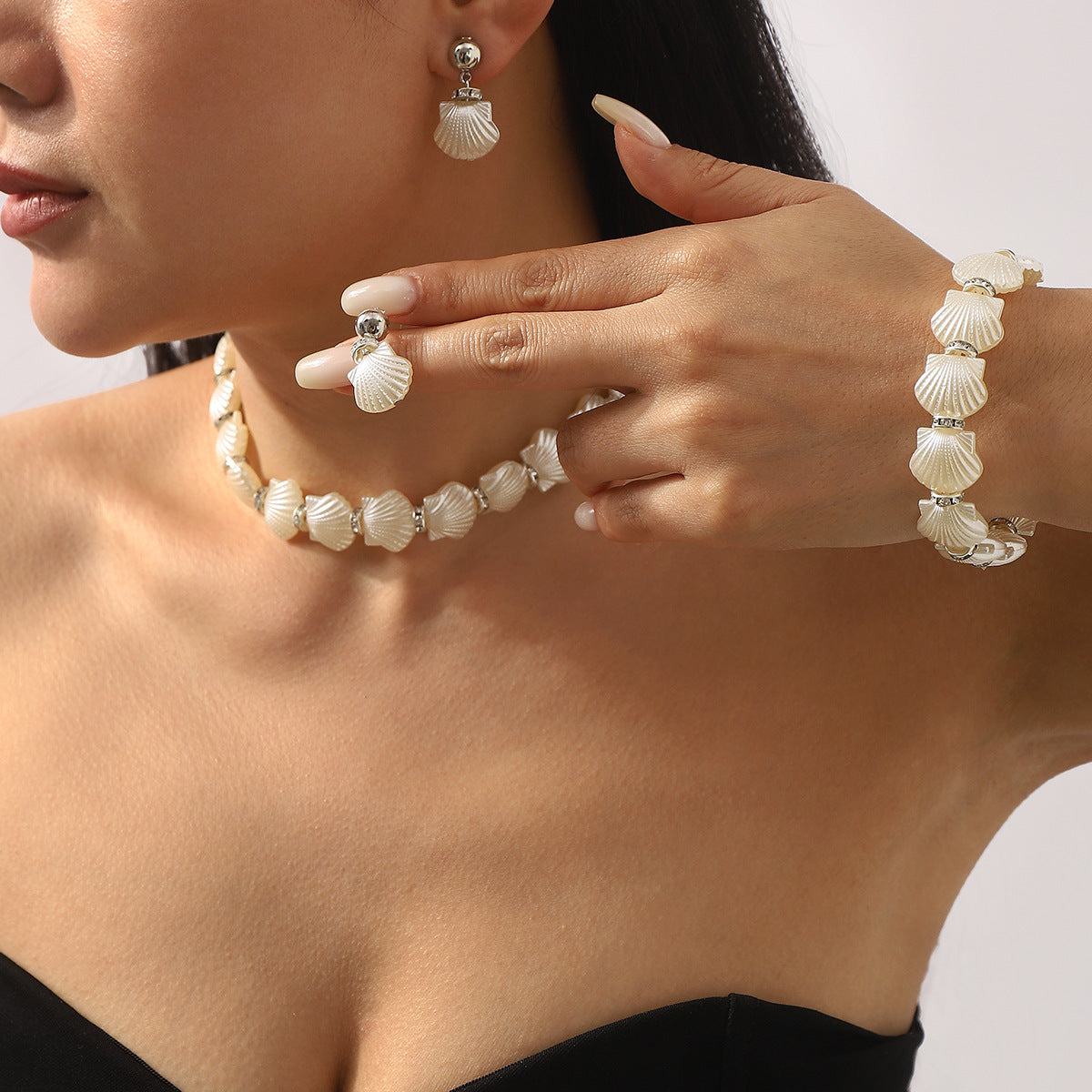 Wholesale Shell jewelry set with diamonds, resin earrings, necklaces and bracelets